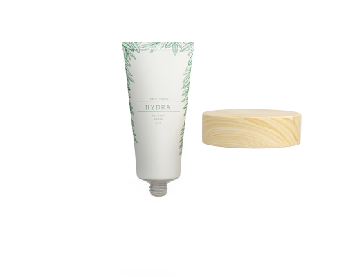 Image d'un tube cosmétique et un couvercle.